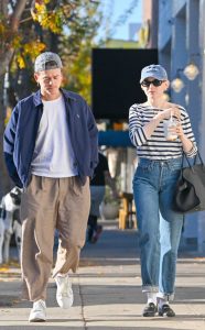 Julia Garner in a Blue Cap