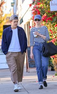 Julia Garner in a Blue Cap