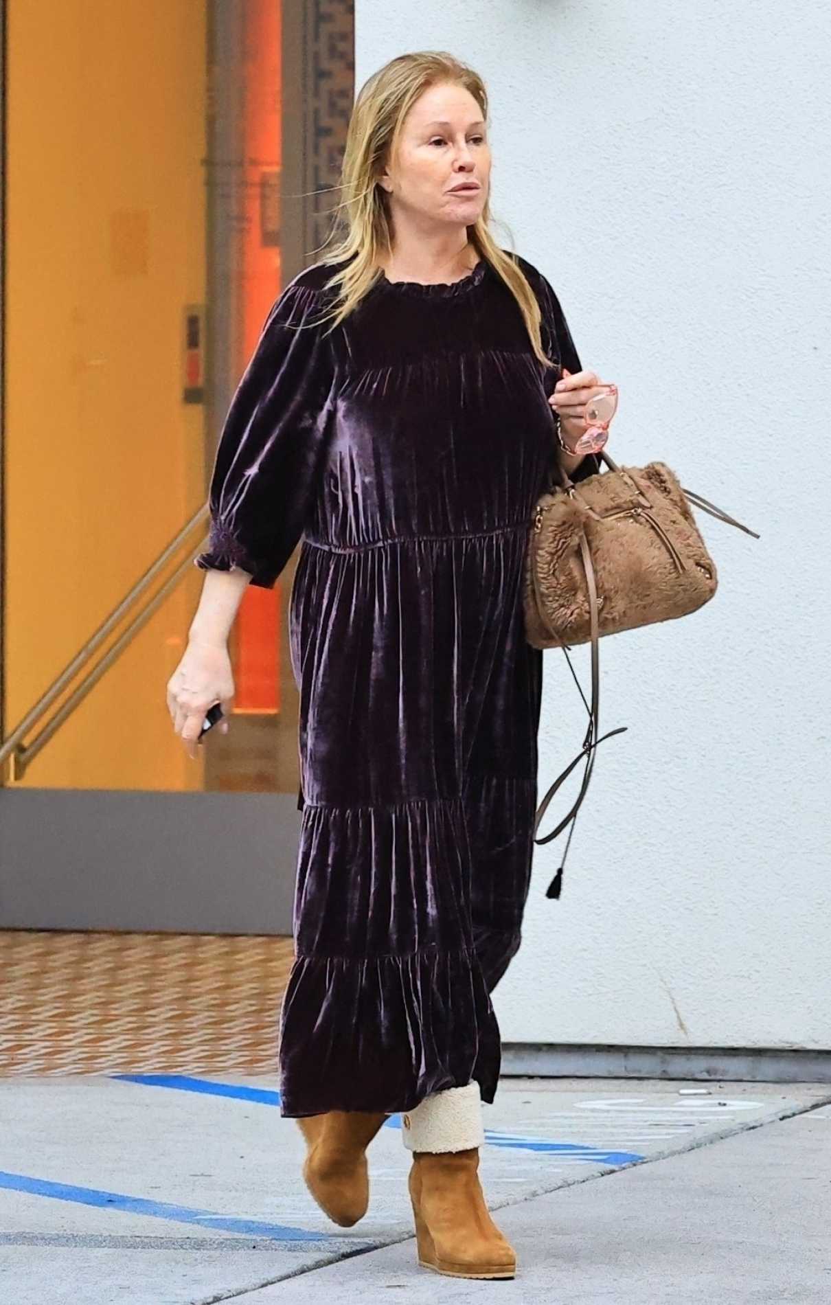 Kathy Hilton in a Purple Dress