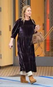 Kathy Hilton in a Purple Dress