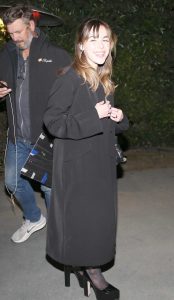 Kiernan Shipka in a Black Coat