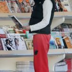 Lisa Rinna in a Red Sweatpants Checking Out Magazines at a News Stand in Los Angeles 11/30/2024