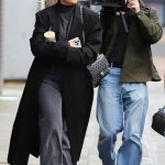 Molly-Mae Hague in a Black Coat Filming Scenes for Her New Molly-Mae Behind It All in Manchester City 12/18/2024