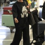 Shania Twain in a Black Sweatshirt Arrives at LAX Airport in Los Angeles 12/28/2024