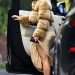 Addison Rae in a Beige Fur Jacket Visiting a Friend’s House in Los Angeles 01/21/2025