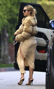 Addison Rae in a Beige Fur Jacket