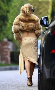 Addison Rae in a Beige Fur Jacket