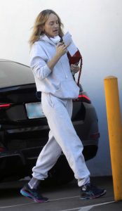 Amber Valletta in a Grey Sweatsuit