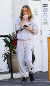 Amber Valletta in a Grey Sweatsuit