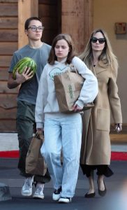 Angelina Jolie in a Beige Coat