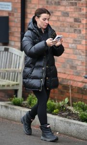 Coleen Rooney in a Black Puffer Jacket