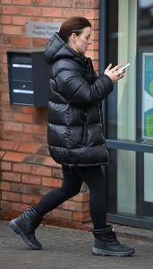 Coleen Rooney in a Black Puffer Jacket