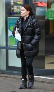 Coleen Rooney in a Black Puffer Jacket