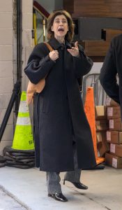 Fernanda Torres in a Black Coat