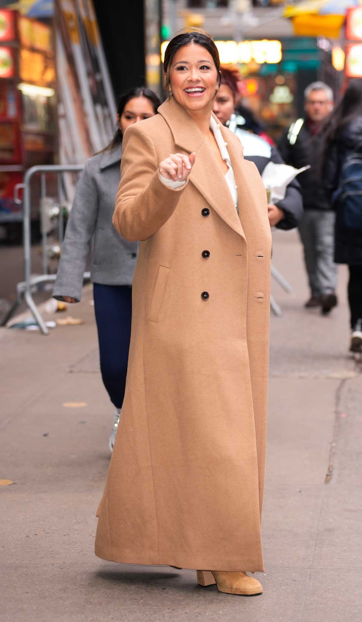 Gina Rodriguez in a Beige Coat