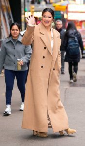 Gina Rodriguez in a Beige Coat