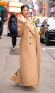 Gina Rodriguez in a Beige Coat