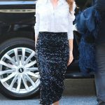 Isla Fisher in a Blue Shirt Arrives at a Taping of The Drew Barrymore Show in New York City 01/28/2025