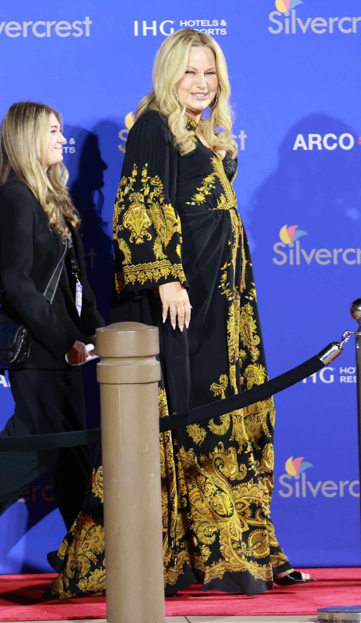 Jennifer Coolidge in a Black Patterned Dress