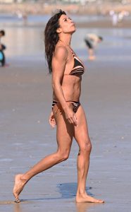 Jenny Powell in a Patterned Bikini