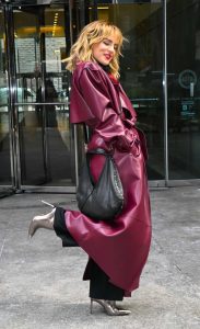 Joanna JoJo Levesque in a Burgundy Leather Coat