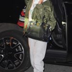 Rita Ora in an Olive Bomber Jacket Arrives at JFK Airport in New York City 01/02/2025