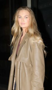 Romee Strijd in a Tan Leather Coat