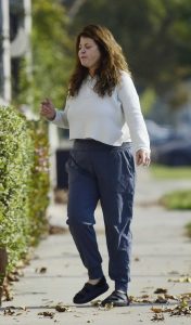 Yasmine Bleeth in a Grey Track Pants