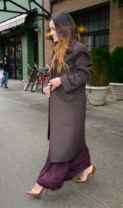 Adria Arjona in a Brown Coat