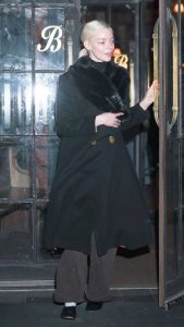 Anya Taylor-Joy in a Black Coat