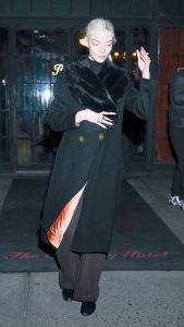 Anya Taylor-Joy in a Black Coat