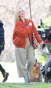 Elle Fanning in an Orange Bomber Jacket