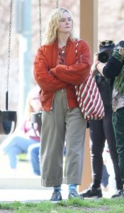 Elle Fanning in an Orange Bomber Jacket