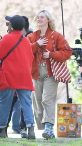 Elle Fanning in an Orange Bomber Jacket