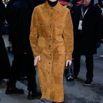 Emma Myers in an Orange Coat Arrives at the Calvin Klein Fashion Show During 2025 NYFW in New York City 02/07/2025
