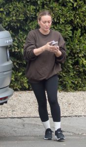 Hilary Duff in a Black Sneakers