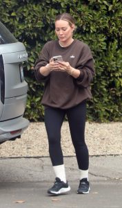 Hilary Duff in a Black Sneakers