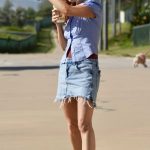 Isla Fisher in a Blue Denim Shorts Was Seen Out with Michelle Buteau on the Gold Coast 02/27/2025