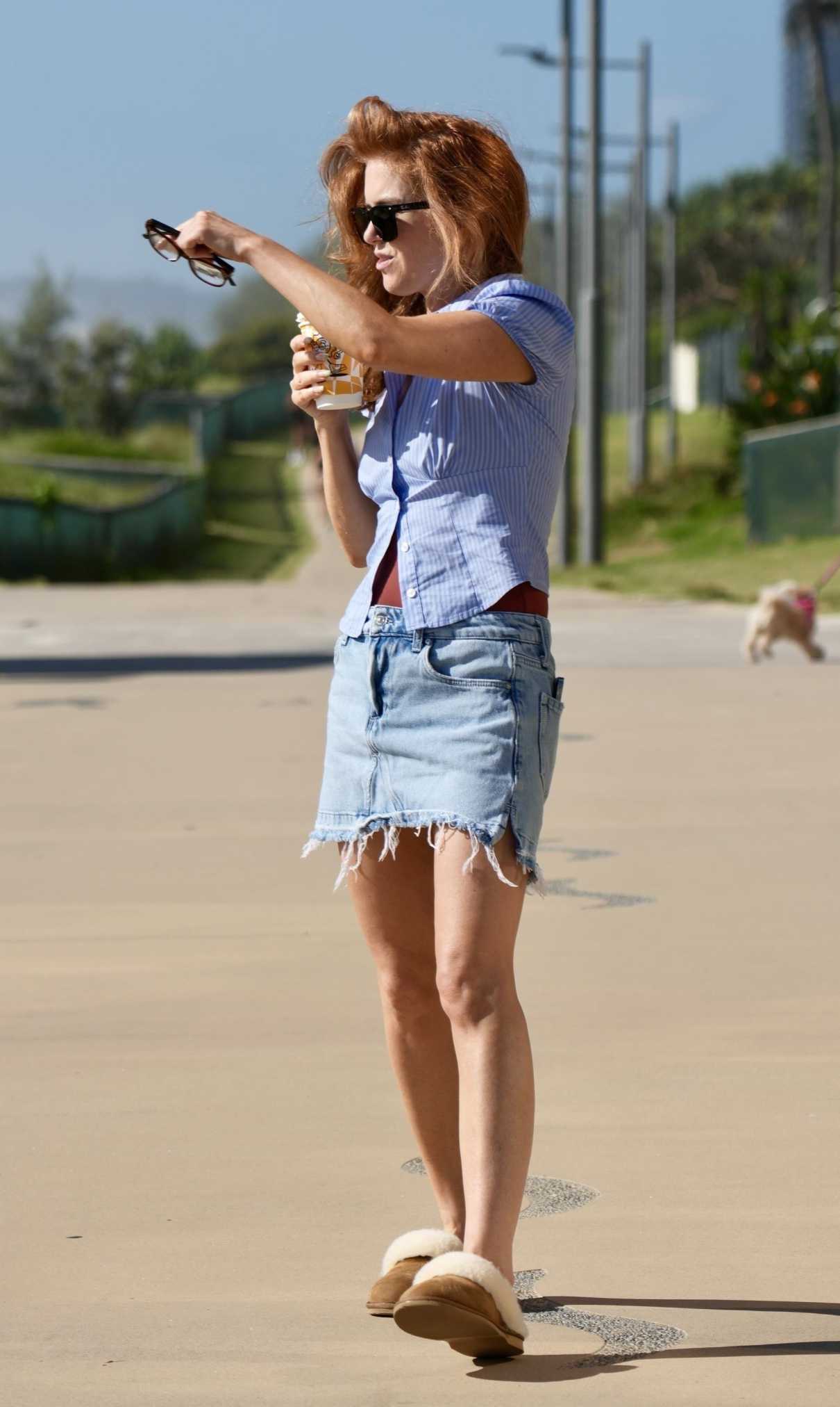 Isla Fisher in a Blue Denim Shorts