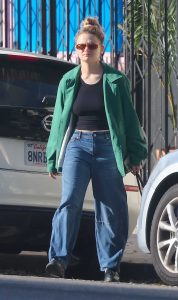 Joey King in a Green Jacket