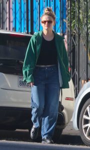 Joey King in a Green Jacket