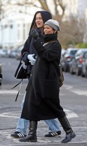 Taylor Russell in a Black Coat