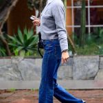 Alessandra Ambrosio in a Grey Sweater Braves the Rain on Melrose Place in West Hollywood 03/12/2025