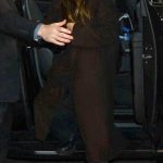 Elizabeth Olsen in a Brown Coat Arrives at a Screening of The Assessment in New York City 03/21/2025