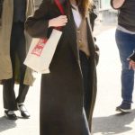 Elizabeth Olsen in a Brown Coat Leaves WNYC Radio in New York City 04/25/2025