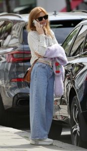 Isla Fisher in a White Polka Dot Blouse