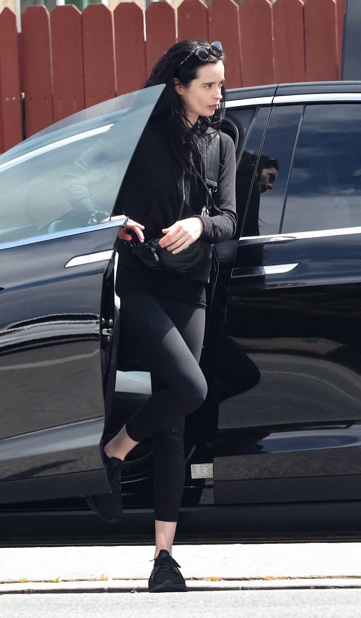 Krysten Ritter in a Black Leggings