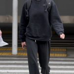 Olivia Dunne in a White Cap Arrives at LAX Airport in Los Angeles 04/25/2025