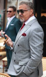 Sylvester Stallone in a Grey Pantsuit