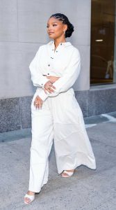 Halle Bailey in a White Pantsuit